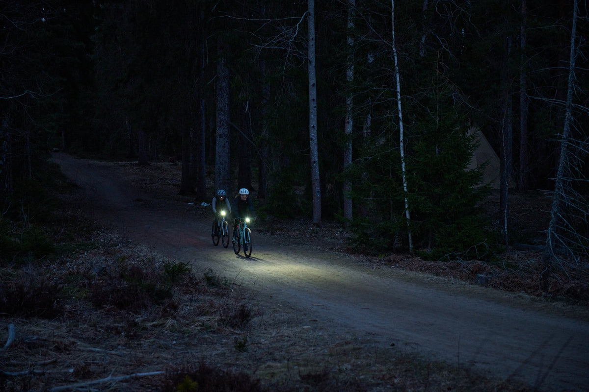Cyclist commuting at night with Bookman lights